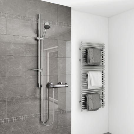 Vettora thermostatic controlled mixer shower shown installed in stunning wetroom